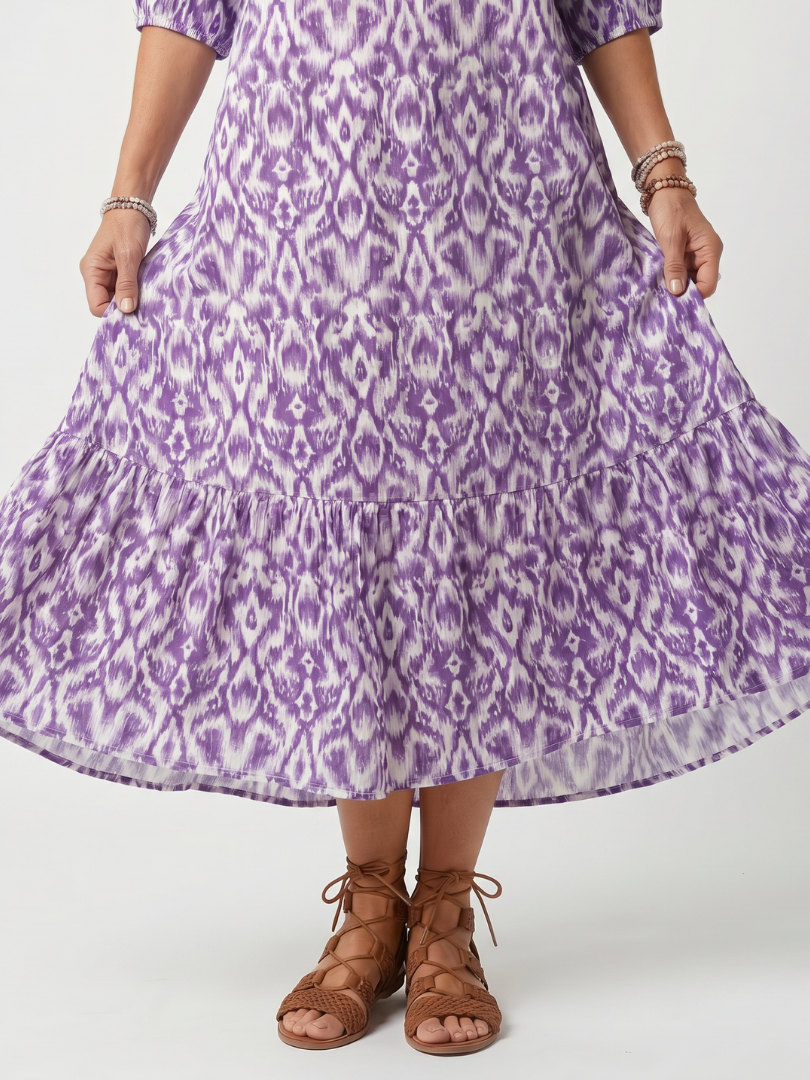 Penelope | Robe midi imprimée à liens et pompons