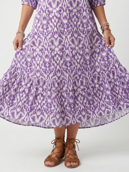 Penelope | Robe midi imprimée à liens et pompons