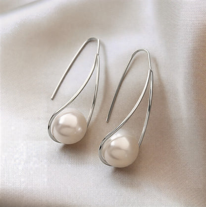 Boucles d'oreilles élégantes en perle mystique