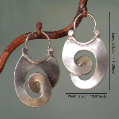 Boucles d'oreilles vintage en argent torsadées