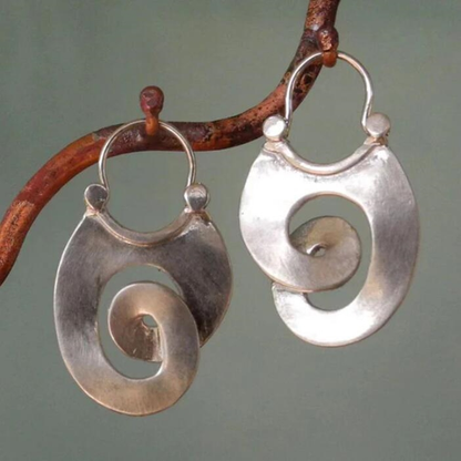 Boucles d'oreilles vintage en argent torsadées