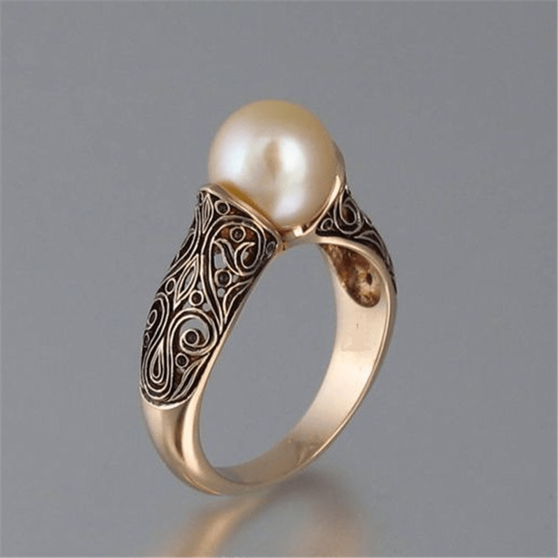Bague vintage à perle dorée