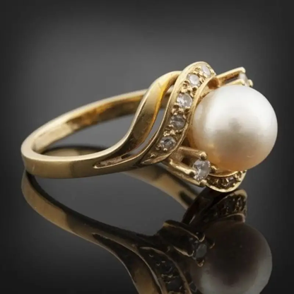 Bague élégante à perle et or brillant