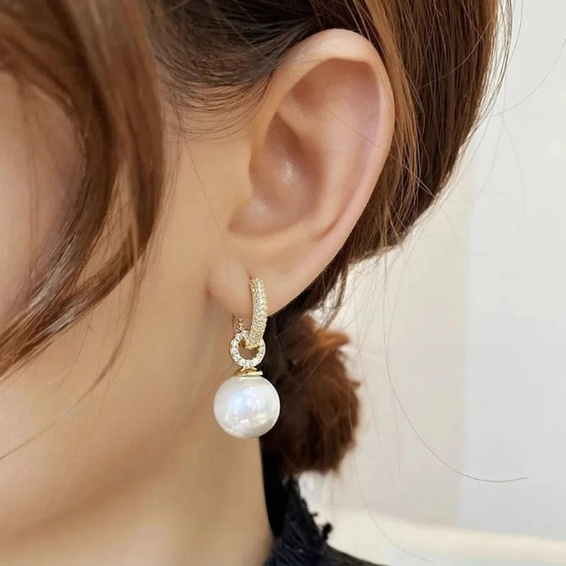Boucles d'oreilles élégantes avec perles