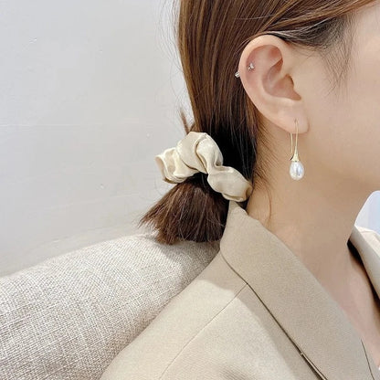 Boucles d'oreilles classiques à perles