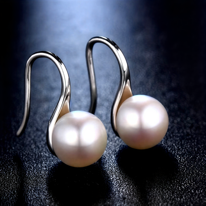 Boucles d'oreilles essentielles à perles